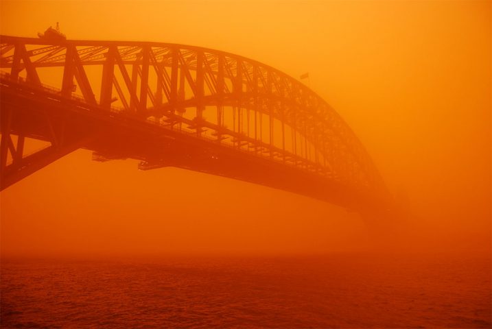 Photo by John Byrne | Sydney Harbour Bridge during a red dust storm